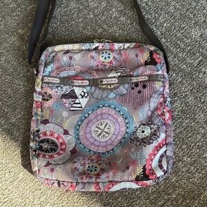 Lesportsac small purse/bag with extra matching pouch.